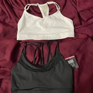 Victoria’s Secret sports bras. 2 Large VSX Sprot bras. A white and a black
